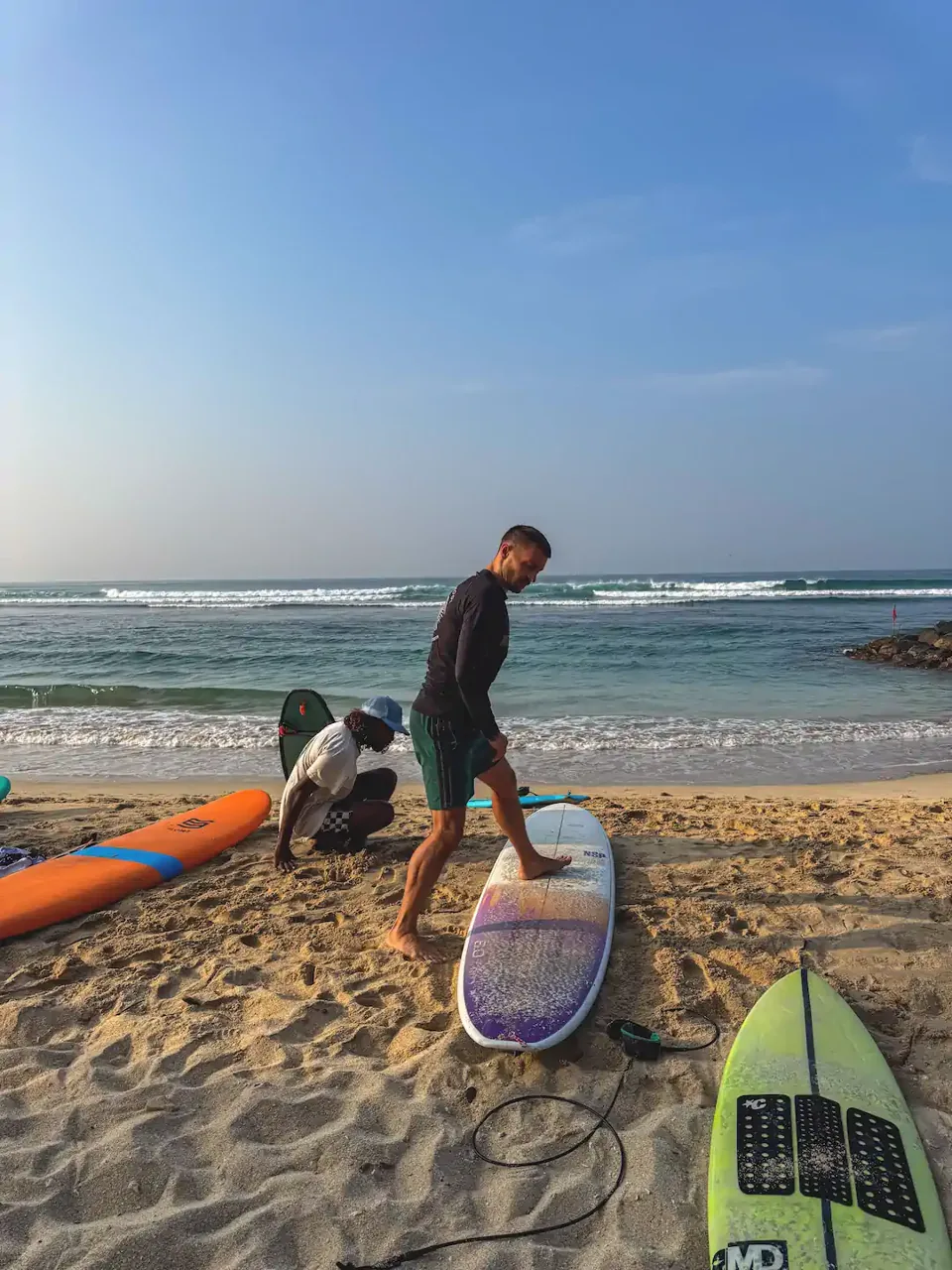 Surfboards beside the sand at Kabalana Beach